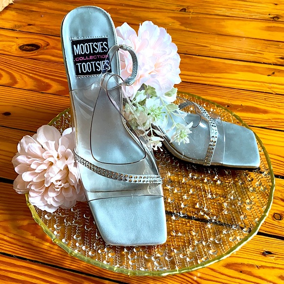 Mootsies Tootsies Shoes - Mootsie Tootsies US size 7 clear and silver heels